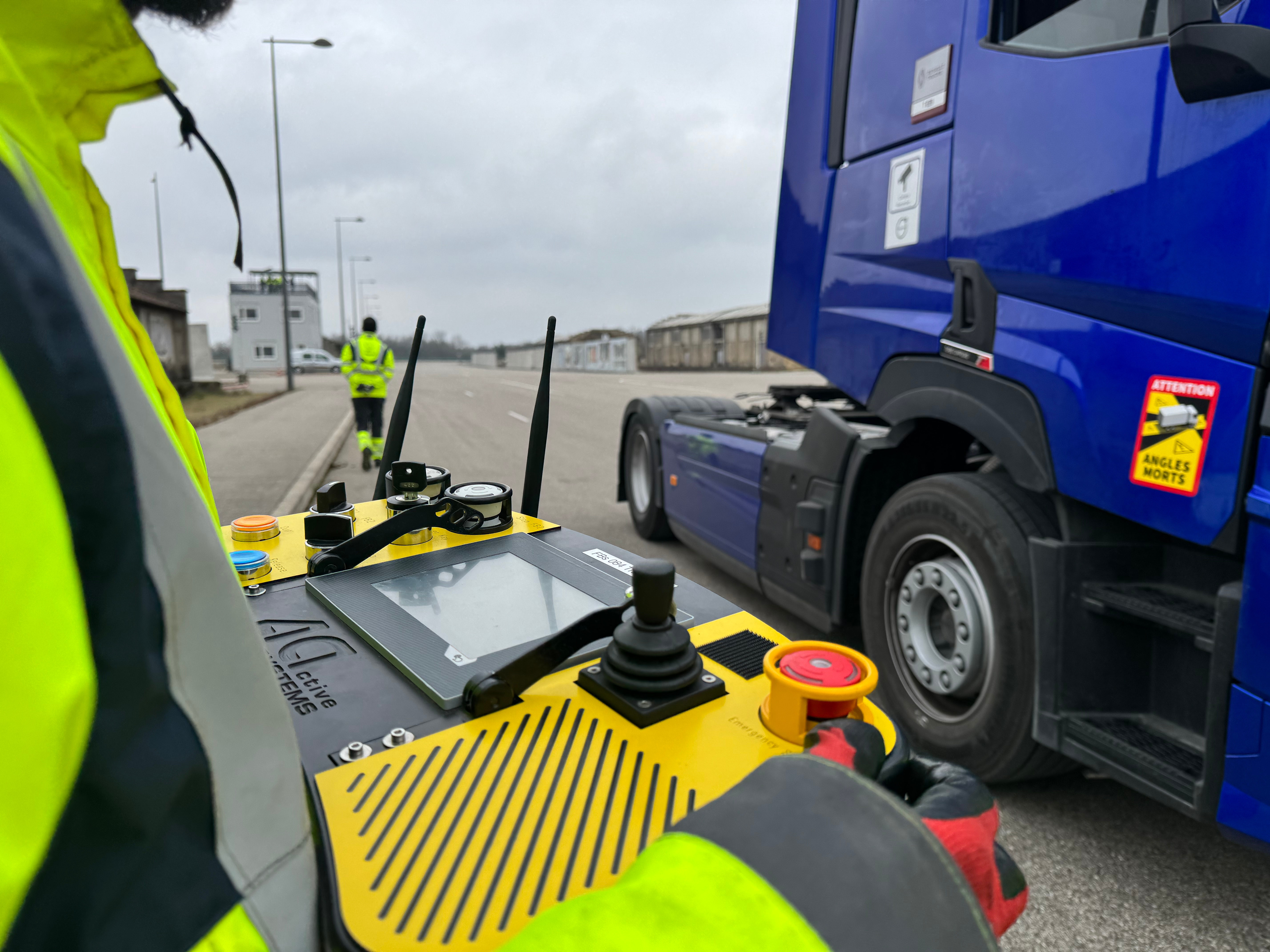 Heavy truck testing protocols in a controlled environment with remote control operation and safety procedures.